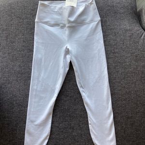 White Fabletics leggings.